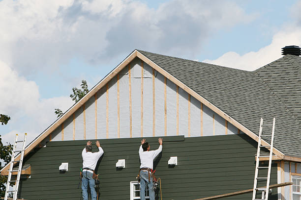 Professional Siding Replacement technician working in Glen Mills, PA